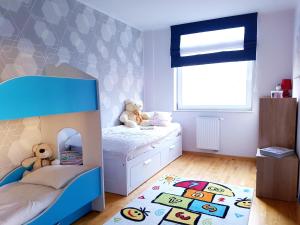 Posteľ alebo postele v izbe v ubytovaní ApartMorze apartamenty Fregata