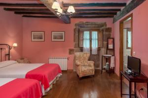 Postel nebo postele na pokoji v ubytování Casona De La Salceda
