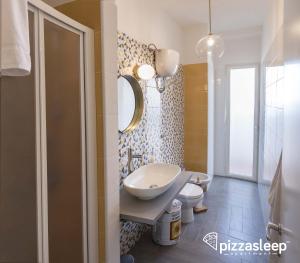 Kúpeľňa v ubytovaní PizzaSleep -apartment-