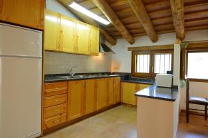 Kuchyň nebo kuchyňský kout v ubytování Apartamento en pleno Montseny Mas Romeu Turisme Rural