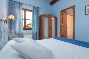 Postel nebo postele na pokoji v ubytování Casona De La Salceda