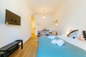 リスボンにあるThe Rossio Studioのベッド1台(枕2つ付)が備わる客室です。