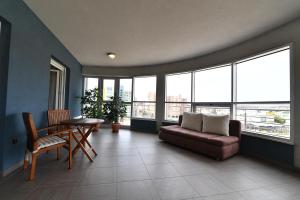 Posezení v ubytování City penthouse Vita