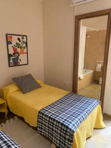 Postel nebo postele na pokoji v ubytování Apartamento Calle Nueva