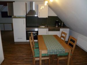 Η κουζίνα ή μικρή κουζίνα στο Ferienhaus zum Kirnitzschtal