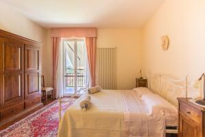 A bed or beds in a room at Villa La Quiete