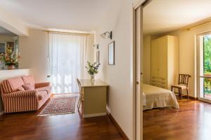 A bed or beds in a room at Villa La Quiete