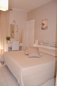 En eller flere senger på et rom på Casa Laura Sorrento