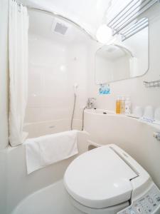 Ett badrum på Super Hotel Takamatsu Kin en kan