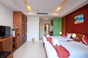TV o dispositivi per l'intrattenimento presso Samui Honey Suite