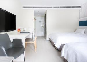 Postel nebo postele na pokoji v ubytování Dandy Hotel - Tianmu Branch + 36 fotografií