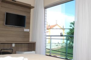 Μια τηλεόραση ή/και κέντρο ψυχαγωγίας στο Pousada Alves