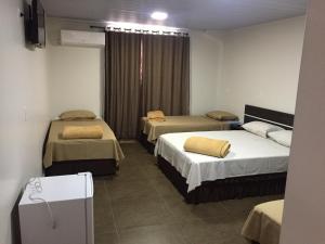 Postel nebo postele na pokoji v ubytování Hotel Paradizzo + 37 fotografií