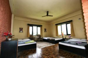 Voodi või voodid majutusasutuse Planet Bhaktapur Hotel toas
