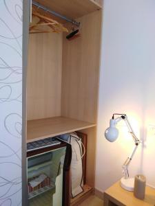an empty closet with a desk and a lamp at DIVA in Roquebrune-sur-Argens
