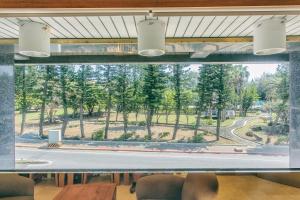 a window in a room with a view of a park at Foung Jia Hotel in Magong