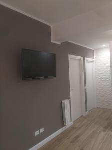TV a/nebo společenská místnost v ubytování Gocce di Girgenti - comfort suites