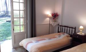 Ένα ή περισσότερα κρεβάτια σε δωμάτιο στο Bernafay Wood B&B