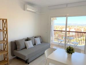 Posedenie v ubytovaní Apartamento 1ª Linea de Mar -WIFI- Aire Acondicionado