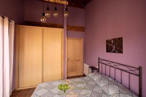 Giường trong phòng chung tại Casa Chaluca