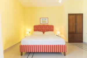 
Ein Bett oder Betten in einem Zimmer der Unterkunft Masseria Sant'Anna
