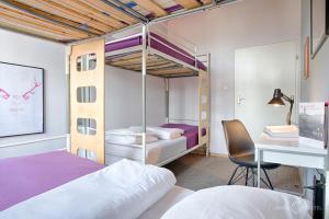 Postel nebo postele na pokoji v ubytování 3 Bros' Hostel Cieszyn
