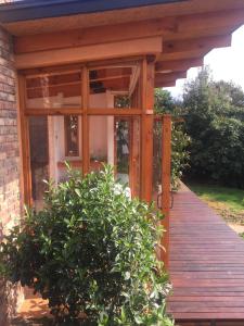 Ein Garten an der Unterkunft Titué Refugio , Cabañas