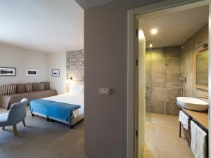 A bed or beds in a room at Rocca dei Saraceni