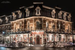 a large building with a christmas tree on it at Prince of Wales in Niagara on the Lake