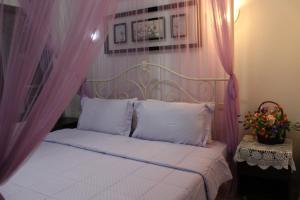 Postel nebo postele na pokoji v ubytování White Elephant Resort