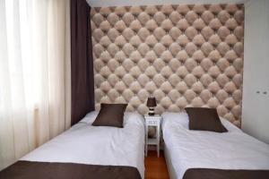 Postel nebo postele na pokoji v ubytování Lodging Apartments FORUM 25 - Barcelona Forum Apartment