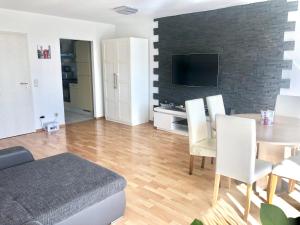 TV a/nebo společenská místnost v ubytování Apartment Lopa