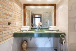 A bathroom at jacuzzi in front of the colosseum