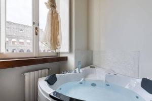 A bathroom at jacuzzi in front of the colosseum