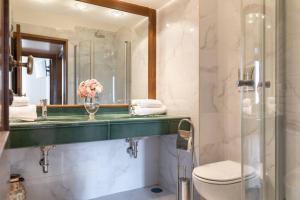 A bathroom at jacuzzi in front of the colosseum