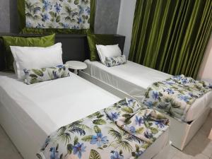 Postel nebo postele na pokoji v ubytování Appartement Touta écologique familial + 37 fotografií