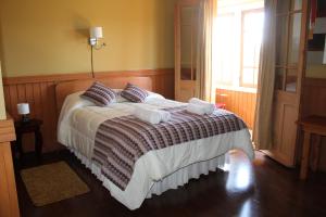 Letto o letti in una camera di Hotel San Giorgio