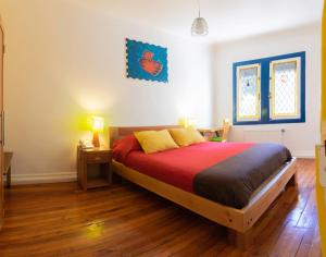 Cama ou camas em um quarto em Hostal Rio Amazonas