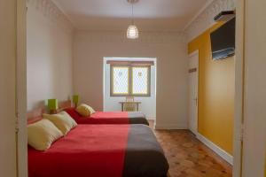 Cama ou camas em um quarto em Hostal Rio Amazonas