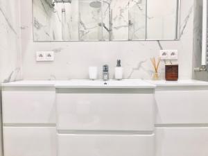 Kúpeľňa v ubytovaní St. Florian Apartament + 13 fotografií