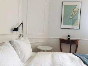 Posteľ alebo postele v izbe v ubytovaní St. Florian Apartament
