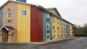 a building with many colors on the side of it at Americas Stay Inn-Leavenworth in Leavenworth