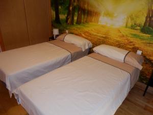 Ένα ή περισσότερα κρεβάτια σε δωμάτιο στο SUNNSHINE