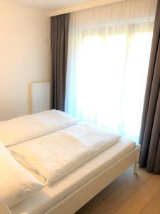 Łóżko lub łóżka w pokoju w obiekcie Rosie | Design | Chalet