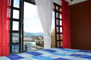 Postel nebo postele na pokoji v ubytování Balcones de la Casona