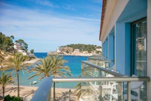 a balcony with a view of the ocean at Los Geranios in Port de Soller