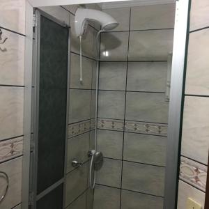 Ένα μπάνιο στο Apartamento a Beira Mar