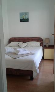 Posteľ alebo postele v izbe v ubytovaní Apartman LOZA