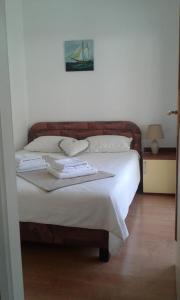 Ліжко або ліжка в номері Apartman LOZA