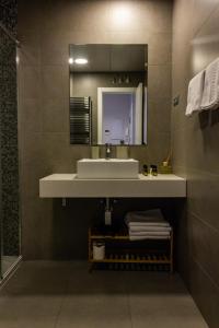 Koupelna v ubytování Arenal Suites Puerta del Sol